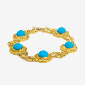 Gold bracelet with turquoise stone accents.